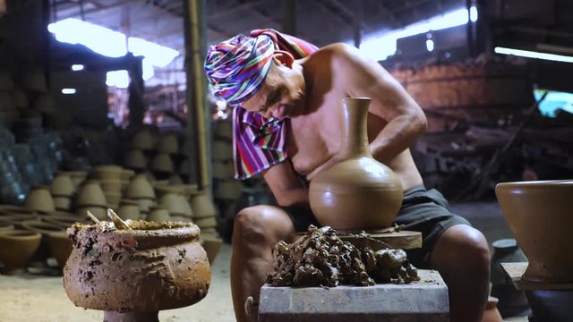 Made of pottery clay, earthenware clays handicrafts, close up, slow motion.