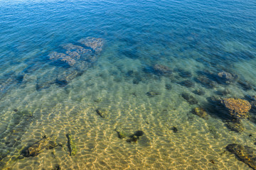 Fototapeta na wymiar Deep blue lake with clean fresh water