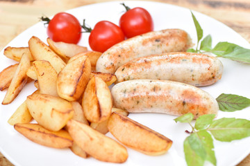 Bavarian sausages. German cuisine. A dish of chicken meat.