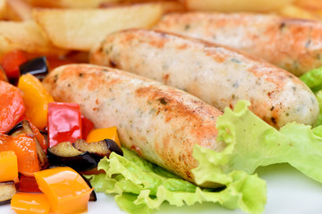 Bavarian sausages. German cuisine. A dish of chicken meat.