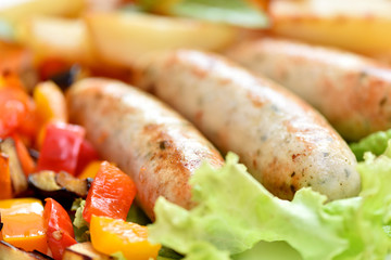 Bavarian sausages. German cuisine. A dish of chicken meat.