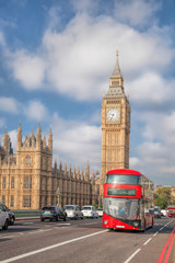 Big Ben with red bus in London, England, UK