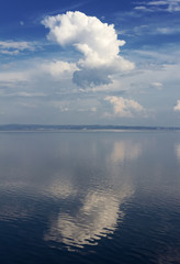 Seascape with a Reflected Big White Cloud