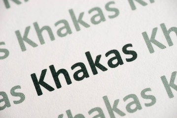 word Khakas language printed on paper macro