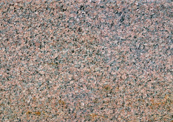 Image of a granite wall as a backdrop.