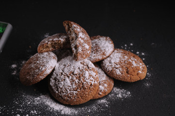 oatmeal cookies on a black table in castor sugar