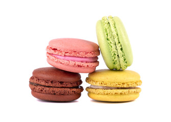 Sweet and colourful french macaroons or macaron on white background. Dessert
