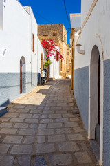  Beautiful narrow street of historic Lindos. Rhodes island, Greece