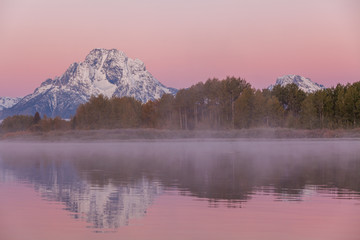 Scenic Sunrise Reflection of the Tetons in Autumn