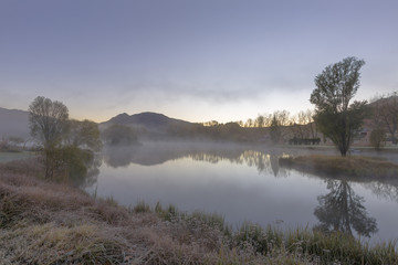 Mist on the water in autumn