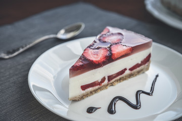 Slice of cheesecake with strawberries