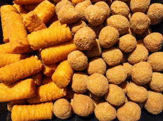 Fresh fried of potato croquettes and olives