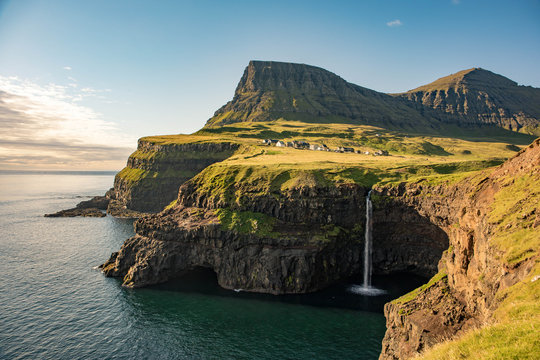 Gásadalur is a village located on the west side of Vágar, Faroe Islands, and enjoys a panoramic view over to the island of Mykines.