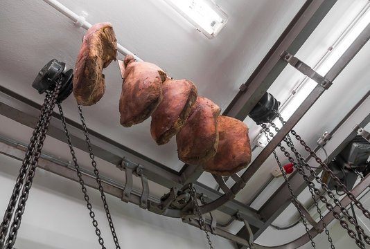 Prosciutto, whole pork leg hanging, drying process, tasty