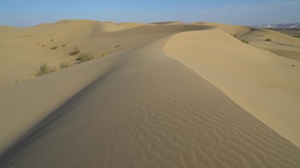 barkhans of sand in the desert