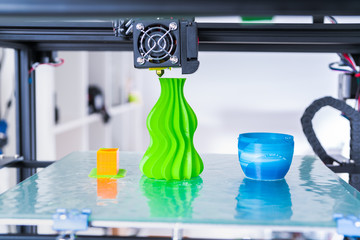 Modern 3D printing.. 3d printer mechanism working during the processes.