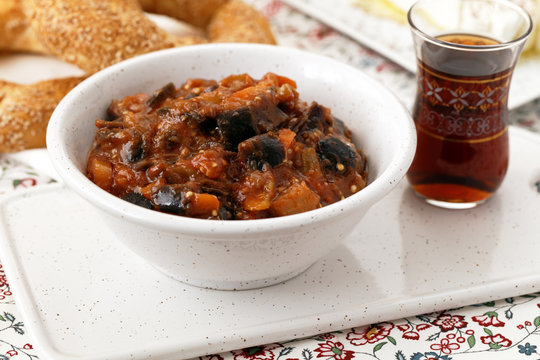 Eggplant and pepper stew with Turkish tea and simits