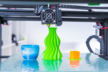 Modern 3D printing.. 3d printer mechanism working during the processes.