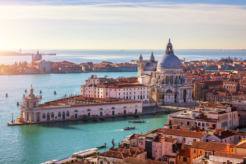 Obraz na płótnie Canvas Aerial View of the Grand Canal and Basilica Santa Maria della Salute, Venice, Italy. Venice is a popular tourist destination of Europe. Venice, Italy.
