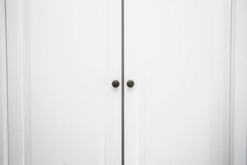 White wooden Closet doors close up background texture