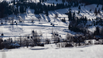 Fototapeta na wymiar Romanian village on a cold winter day