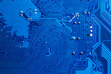 blue circuit board background of computer motherboard