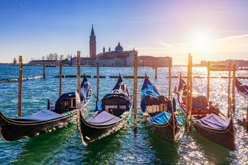 Sunny day in San Marco square, Venice, Italy. Venice Grand Canal. Architecture and landmarks of Venice. Venice postcard with Venice gondolas