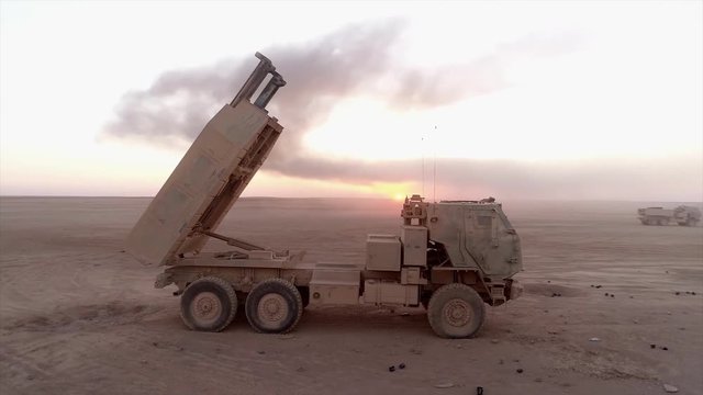 Close up view of a military rocket launcher vehicle in the desert 