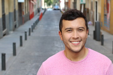 Latino male outdoors with copy space