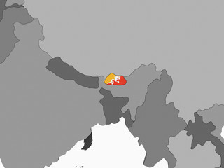 Bhutan with flag on globe