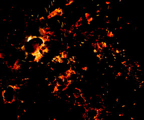 Flame of fire with sparks on a black background