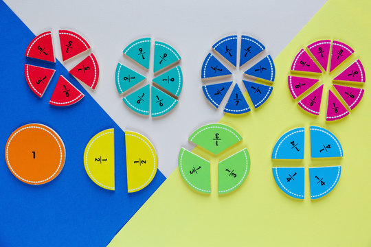 colorful math fractions on the bright backgrounds. interesting math for kids. Education, back to school concept. Geometry and mathematics materials.