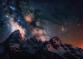 Fototapeta The core of the milkyway rising up over the Grand Tetons in Wyoming obraz