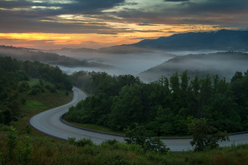 Winding country road at sunrise, Appalachian Mountains