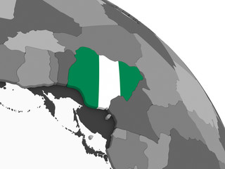 Nigeria with flag on globe