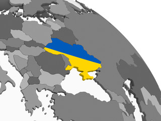 Ukraine with flag on globe