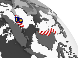 Malaysia with flag on globe