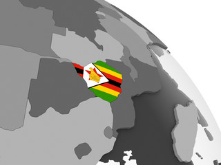 Zimbabwe with flag on globe