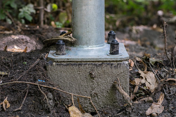 The concrete base of the lighthouse. Construction and fixing of street lighting.