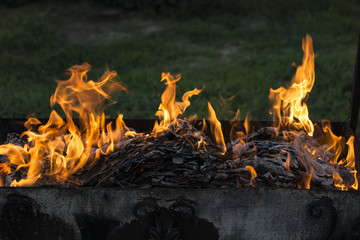 Flaming fire. Documents burning. Dance of fire spirits. Ignition of paper.