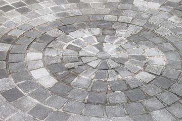 Gray stone circular path walkway.