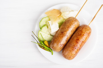 Thai sausage, fermented rice with pork sausage served with vegetables