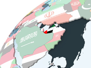 United Arab Emirates with flag on globe