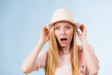 Shocked woman wearing summer outfit