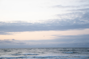 Fototapeta na wymiar Beach Sunrise Landscape with Ocean Waves