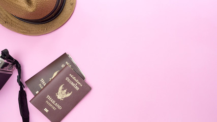 passport thailand and hat on pink background.Travel concept