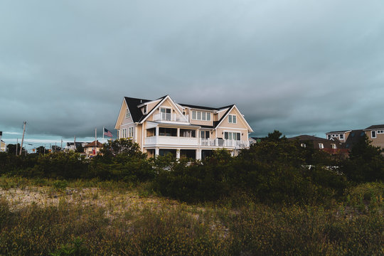 Beach House Behind Grassy Sandy Dunes At Wildwood New Jersey Beach