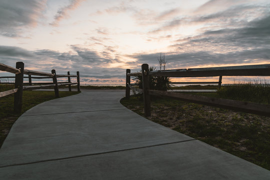 Beautiful Sunrise At Beach Seawall With Pink Blue Magenta Sky At Wildwood New Jersey