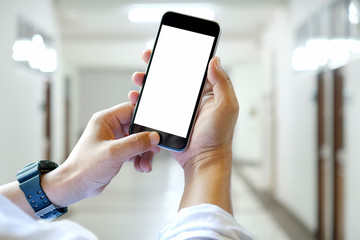 Close up of a man using blank screen mobile smart phone