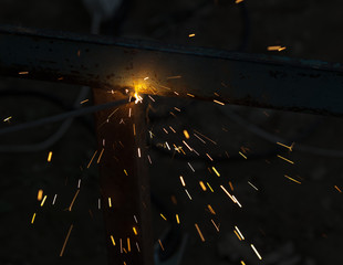 Flash and sparks from electric welding